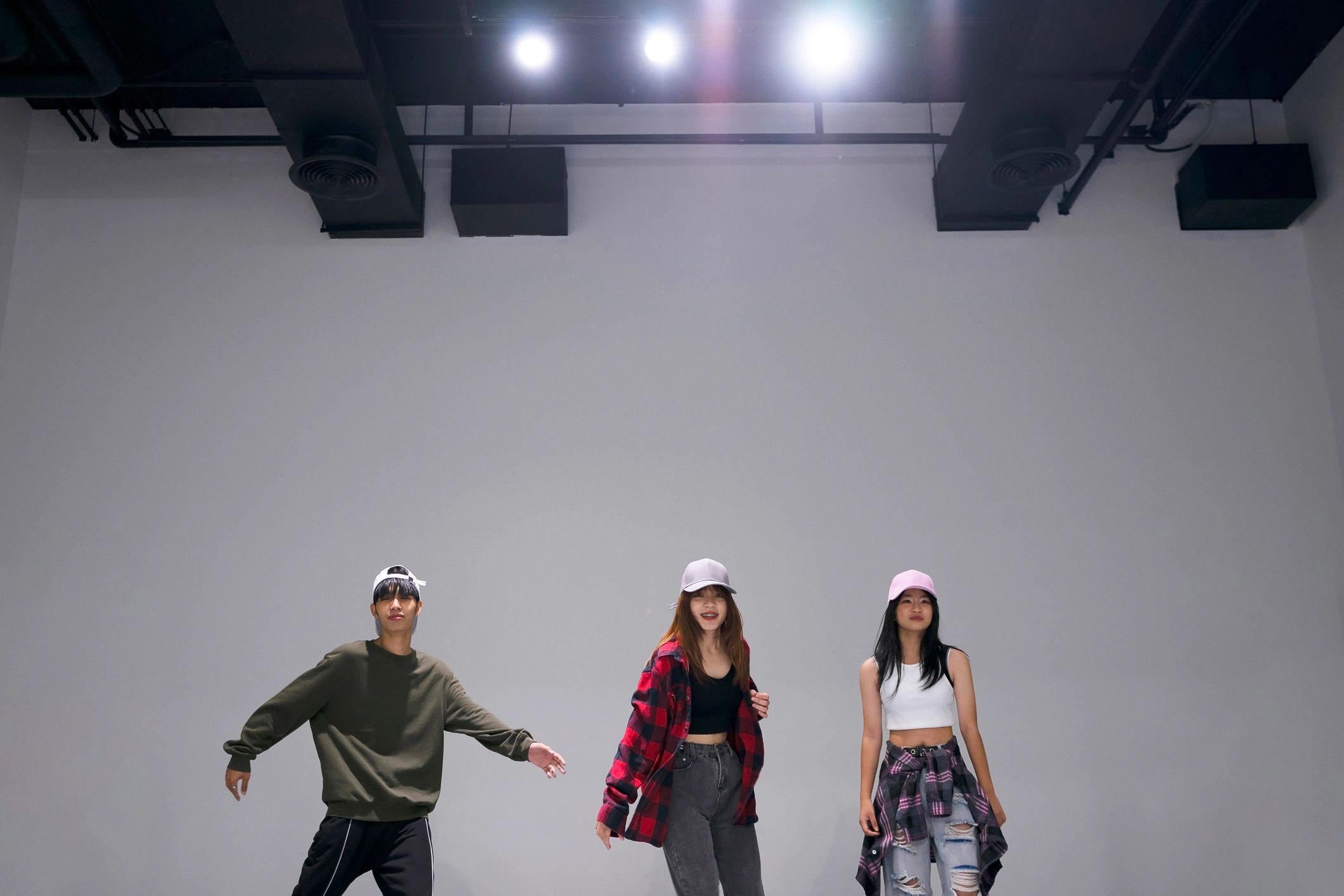 Teen dance students practicing together in a studio